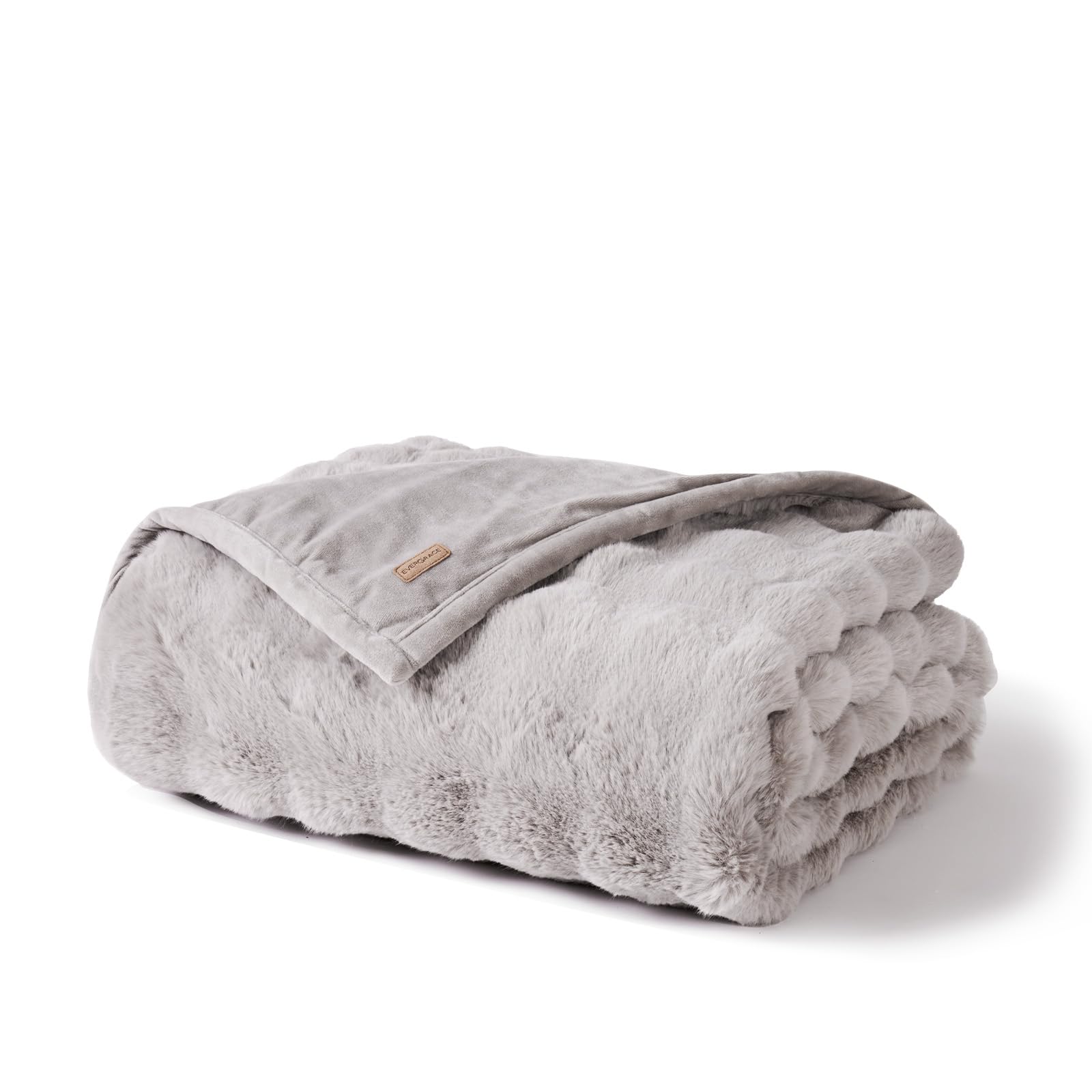 EverGrace lifestyle scene in reading nook showing warmth, texture, and relaxation benefit