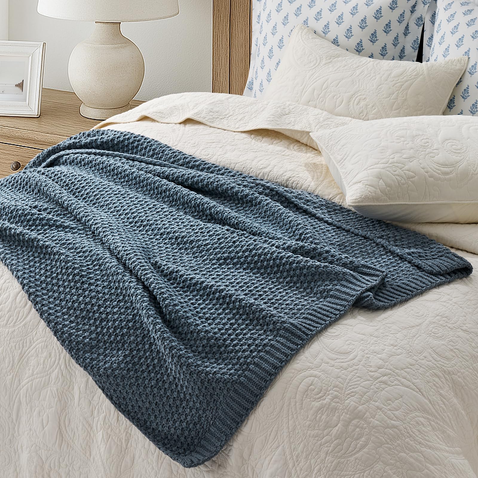 EverGrace folded at bed foot illustrating size and decorative impact