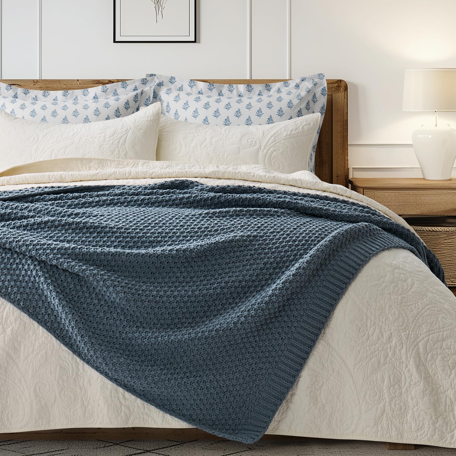 EverGrace held in hands to show 50 x 60 scale and portable comfort
