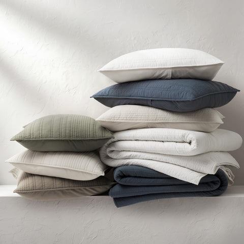 EverGrace quilt layered with blankets to show versatile styling