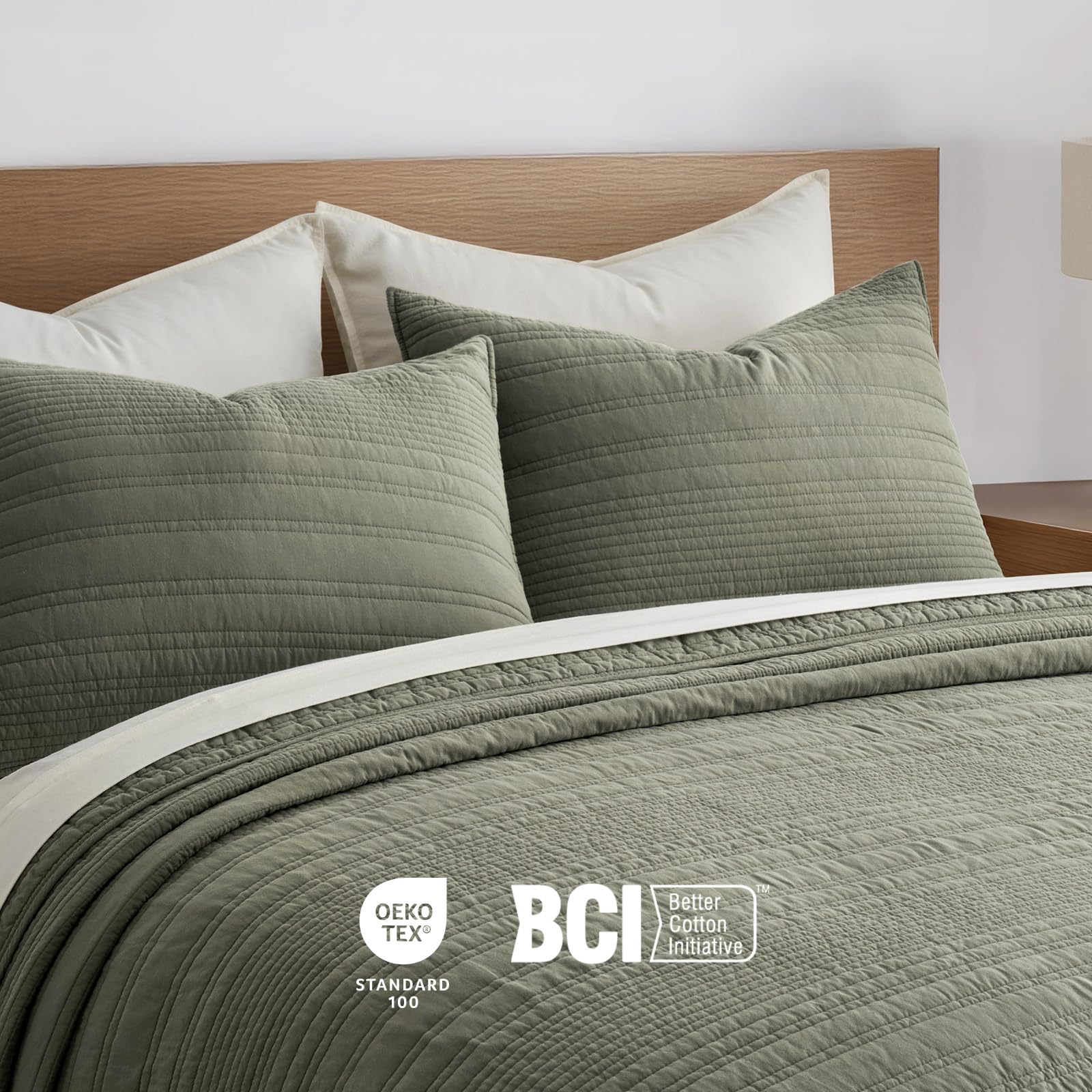 EverGraceHome quilt on a made bed demonstrating olive green styling benefit