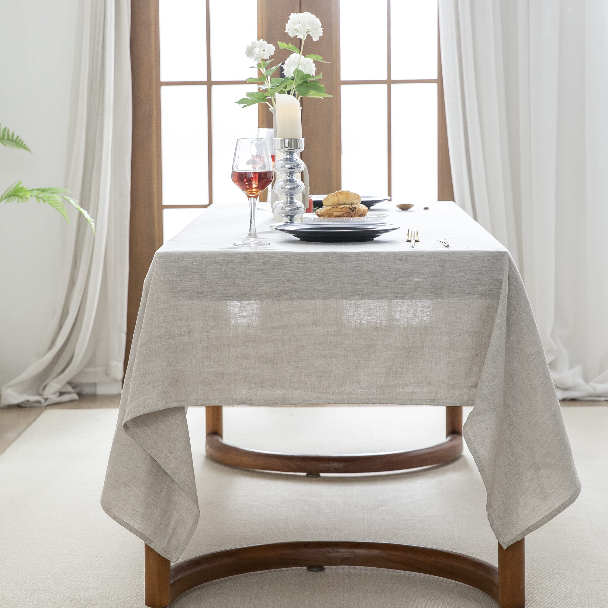 EVERLY draped corner detail showing soft hang and mid-weight fall