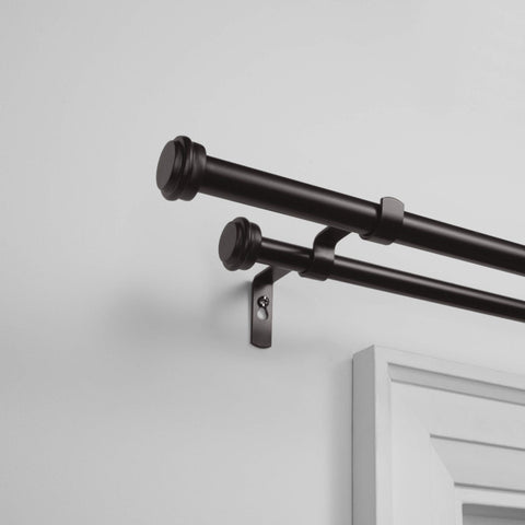 Exclusive Home finial close-up with flat button detail, provides subtle decorative accent