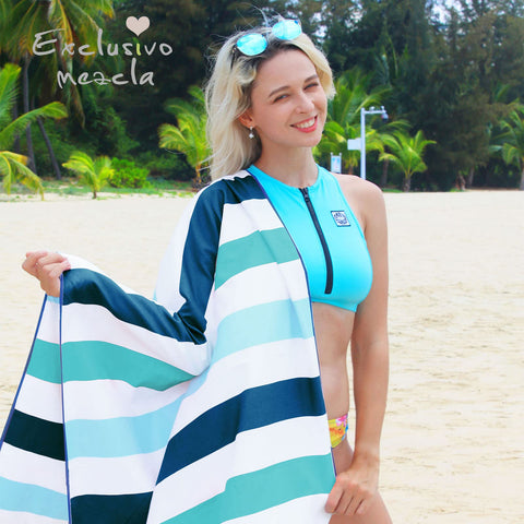 Exclusivo Mezcla folded towel in pouch for compact travel and storage benefit