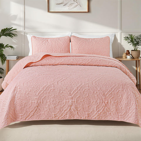 Exclusivo Mezcla front view showing full queen quilt and neat drape for elegant bedding