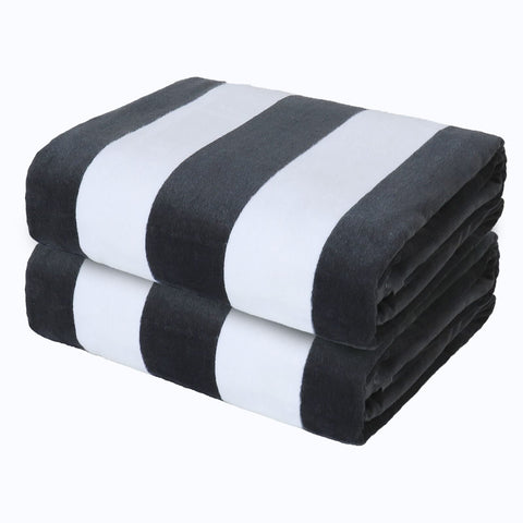 Exclusivo Mezcla front view of two-pack striped towels showing colors and packaging benefit