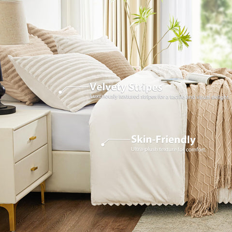 EXQ Home comforter styled on a bed demonstrating warm, neutral bedroom aesthetic