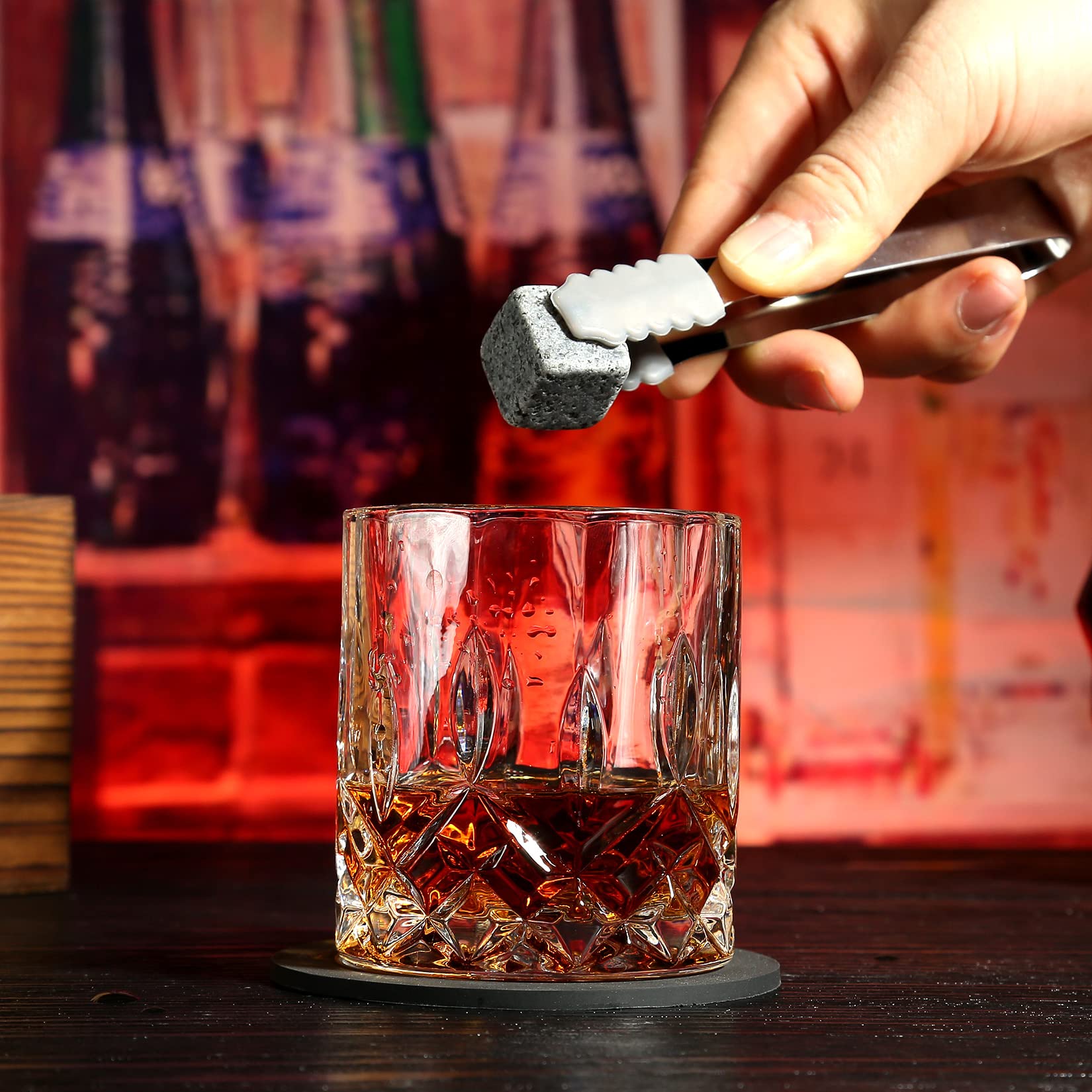 EXREIZST cork coasters and stainless steel tongs detail for neat and sanitary serving