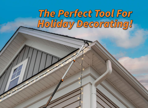 EXTEND-A-REACH hook attached while hanging lights for ladder-free installation