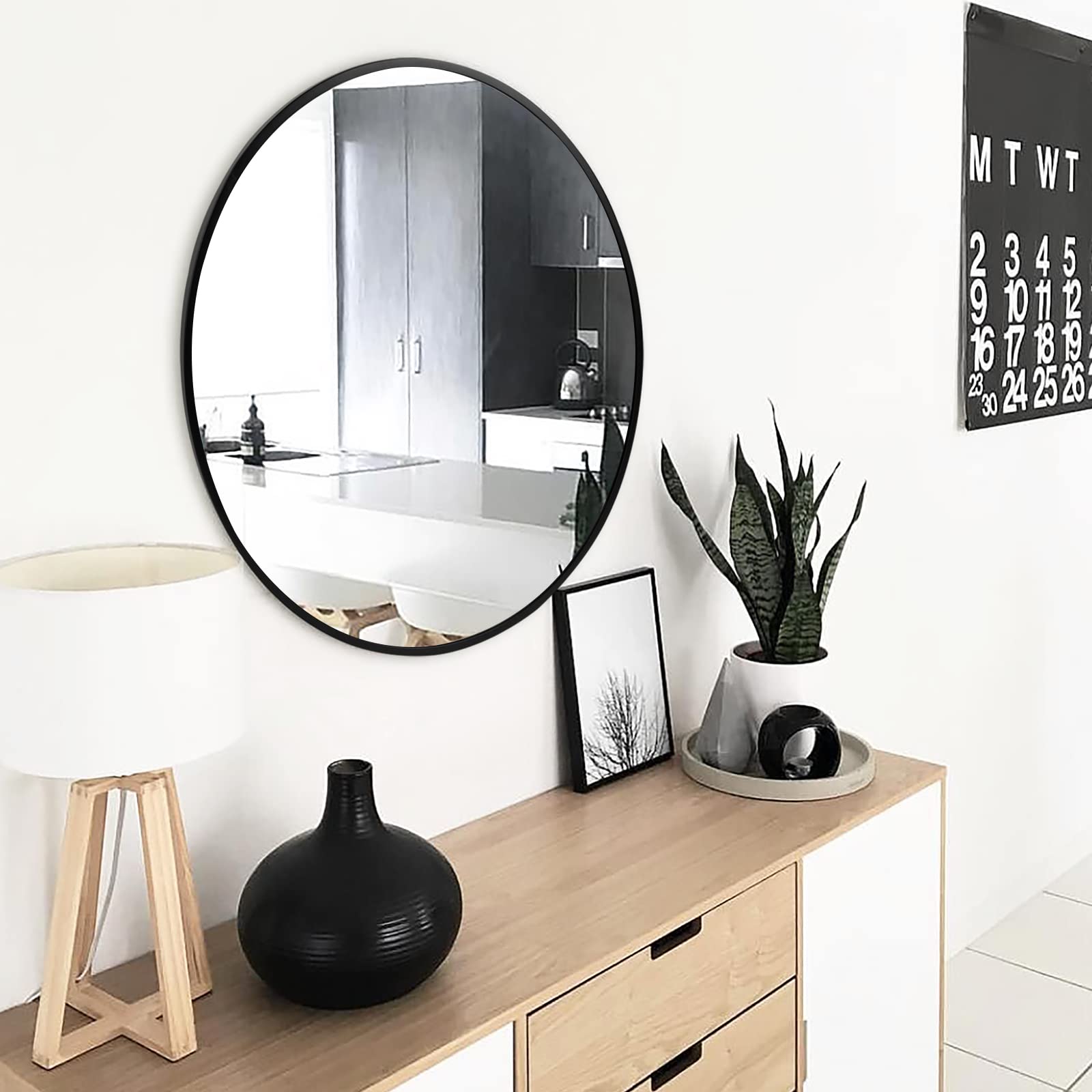 Fabuday mirror mounted in bathroom brightens space and complements tiles