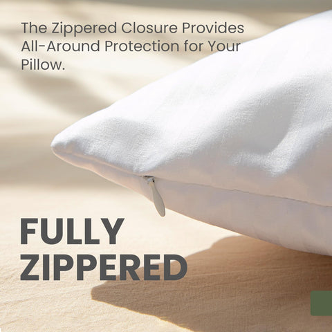 Fairpeak protector under pillowcase in styled bed showing hotel-like appearance benefit