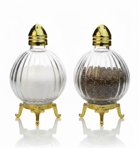Fairturk front view of shakers on gold stand for classy table display