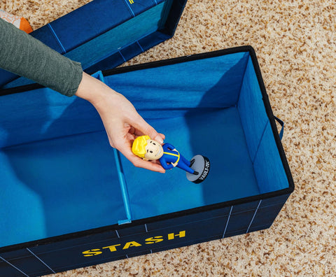 Fallout Vault-Tec scale with game controller to show 24x12 size and fit benefit