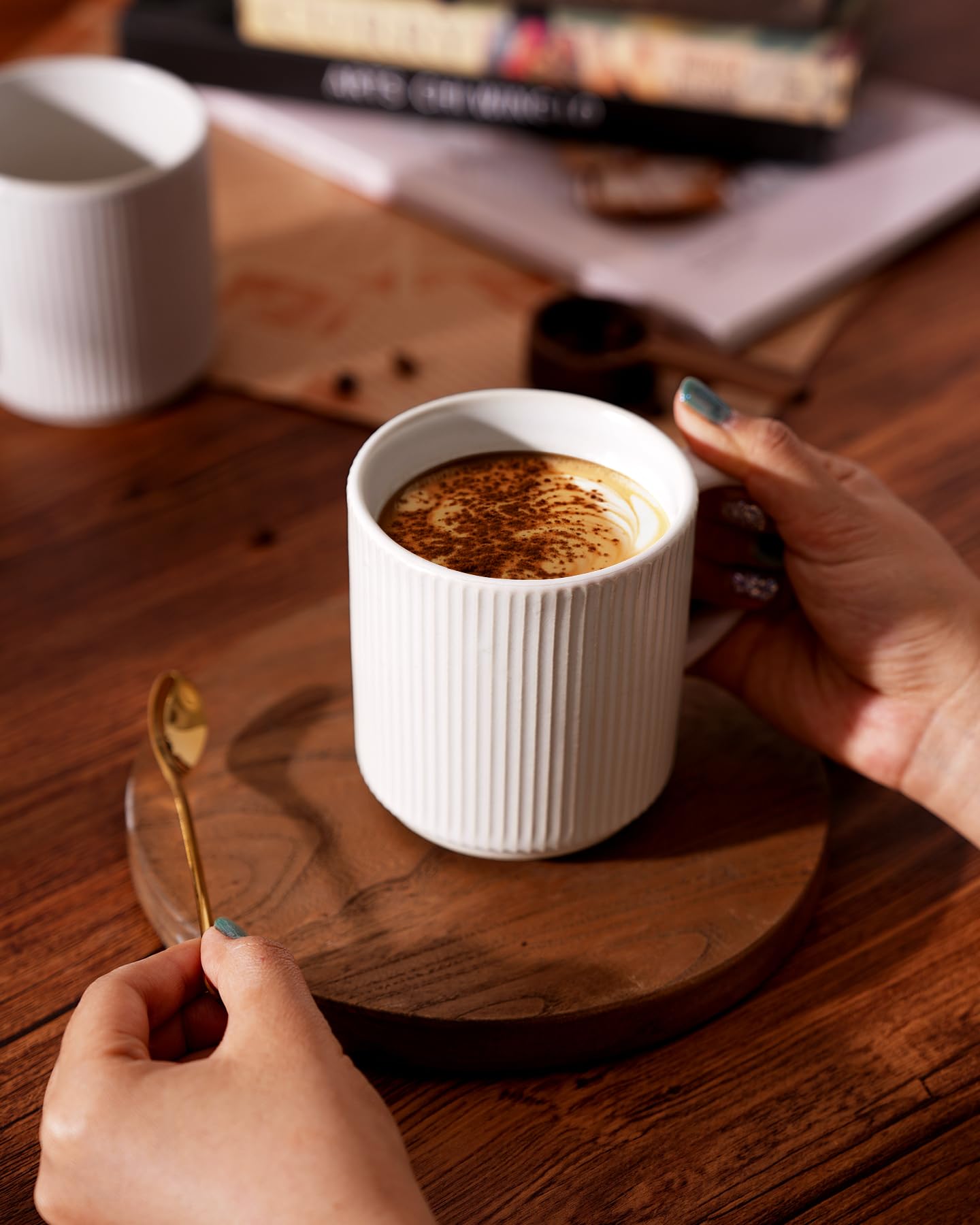 famiware mug held in hand for scale and balanced weight benefit