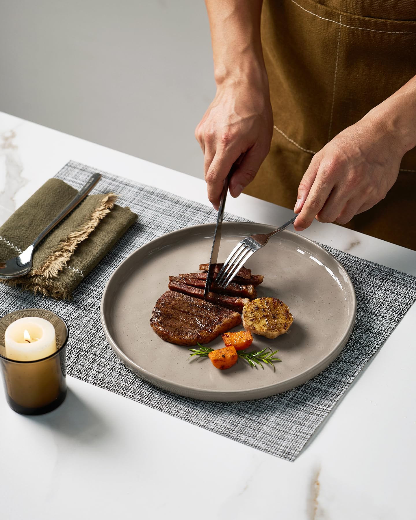 famiware hand holding plate to show true size and ergonomic scale