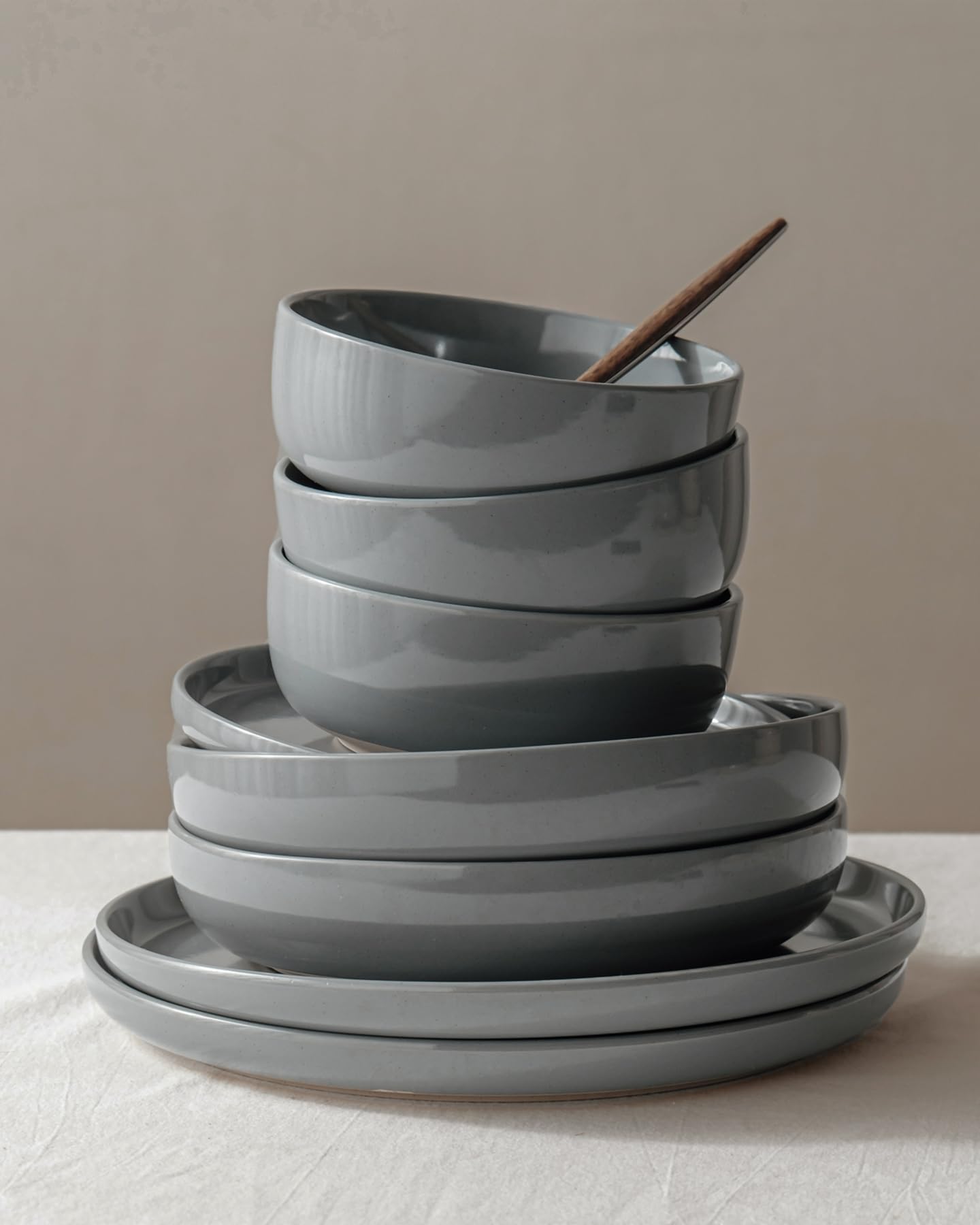 Famiware boxed 12-piece set arranged to show included dinner plates, salad plates, bowls