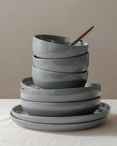 Famiware boxed 12-piece set arranged to show included dinner plates, salad plates, bowls