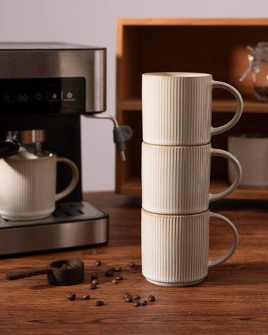 famiware mug next to a smartphone for scale, clarifies 12 oz capacity