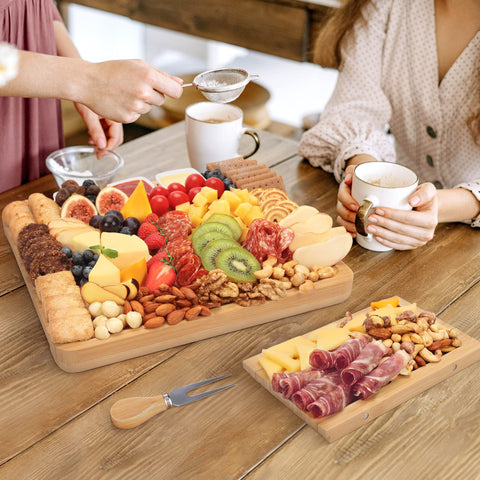 FamRica board being held to show scale and portability for easy serving