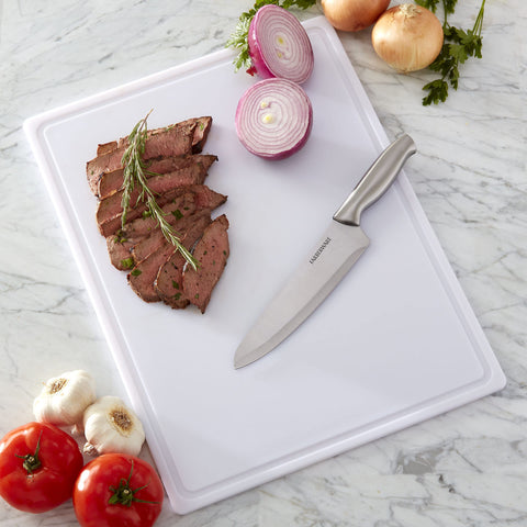 Farberware board beside dinner plate showing true size and scale