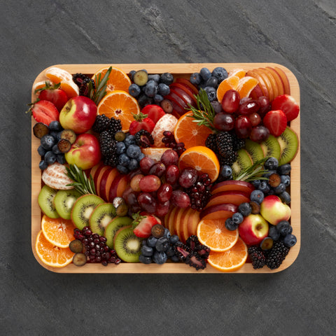 Farberware board next to utensils to show size for planning portions