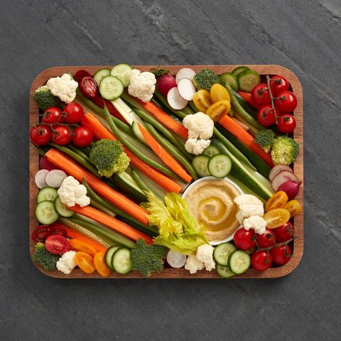 Farberware board next to utensils to show 11x14 size for planning servings