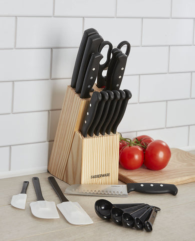 Farberware wood block on counter organizing knives and protecting blades