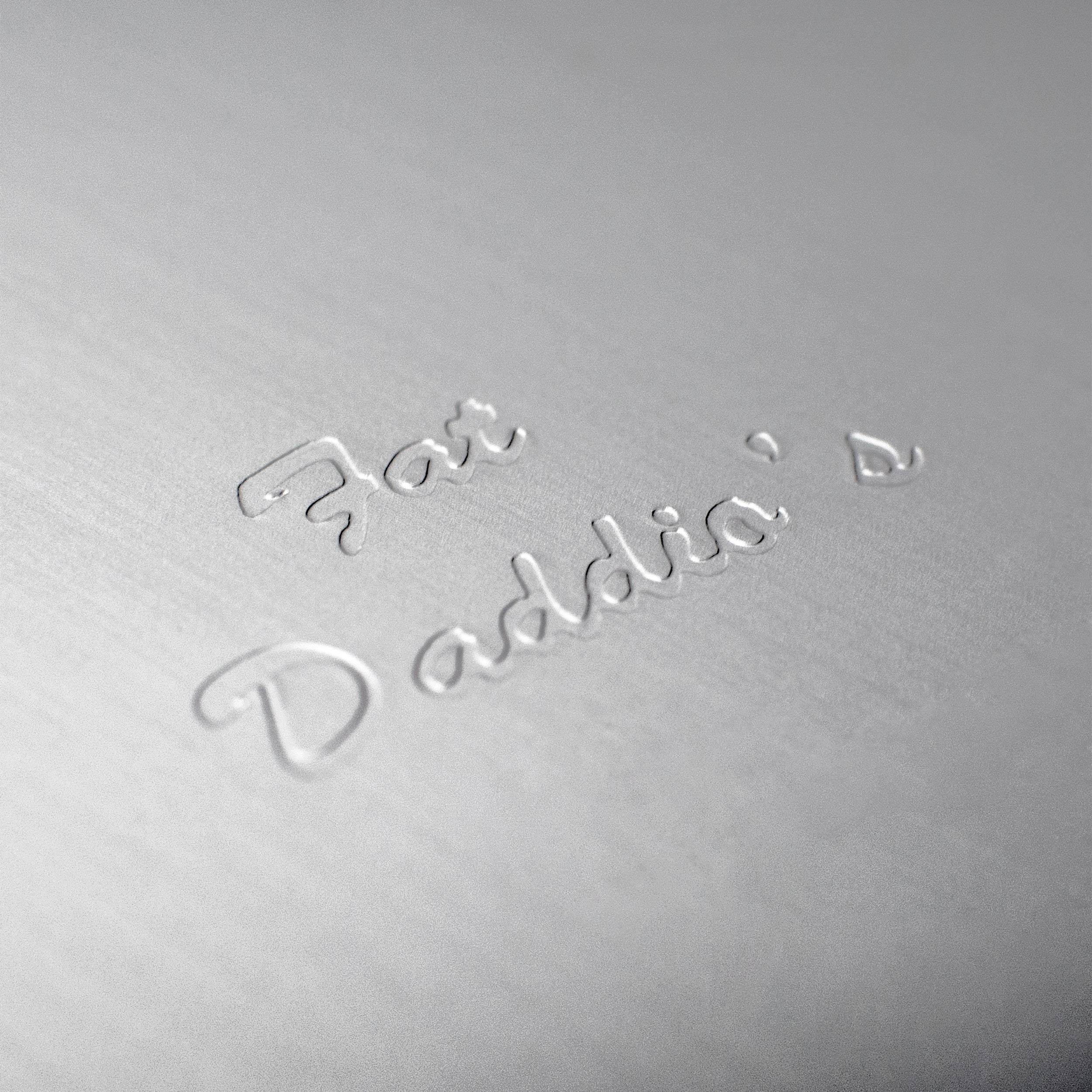 Fat Daddio's pan beside a spatula showing size and capacity for family meals