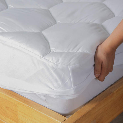 Favorland mattress pad on a twin bed in bedroom scene offering neat, breathable sleep