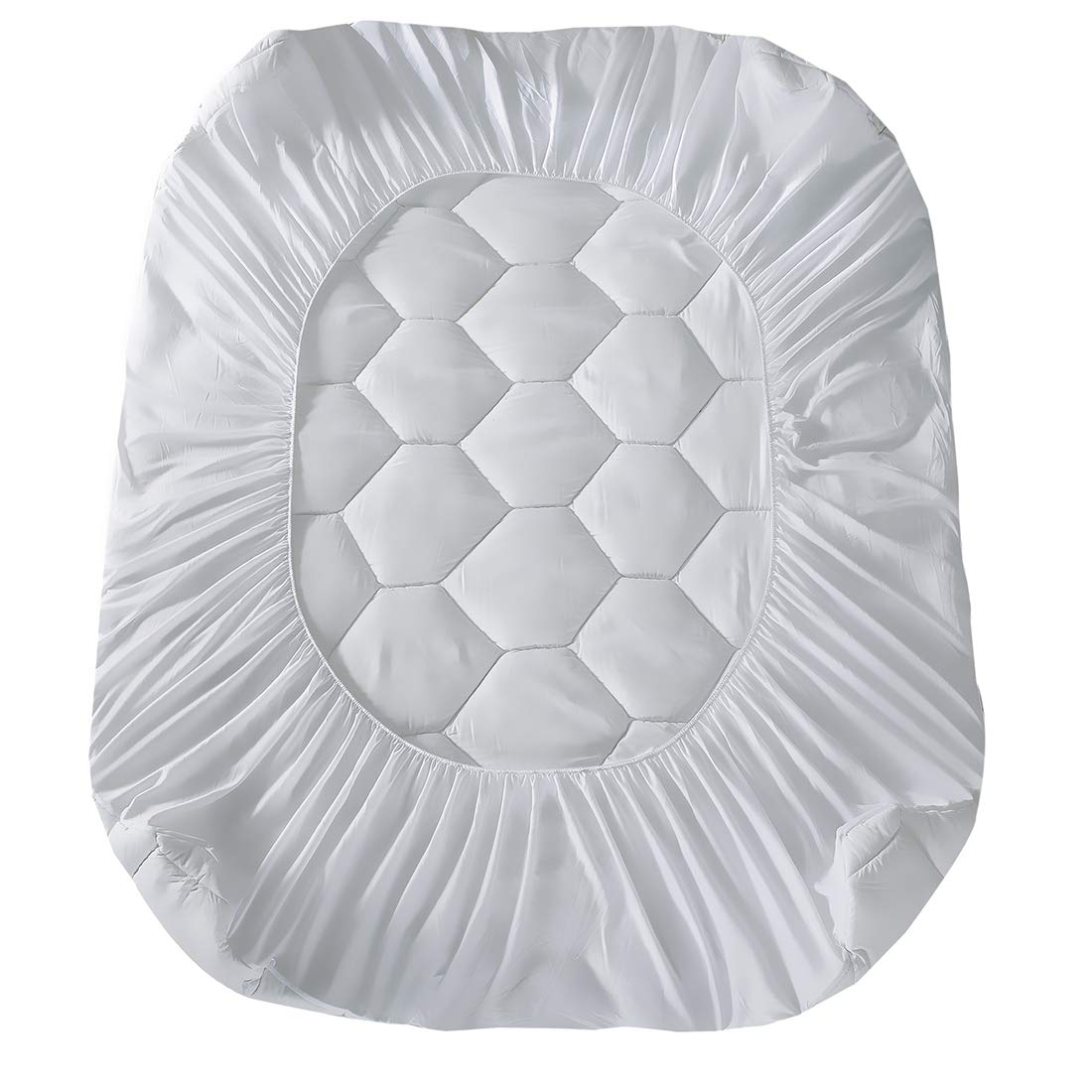 Favorland pad beside ruler showing scale and compatibility with deep mattresses