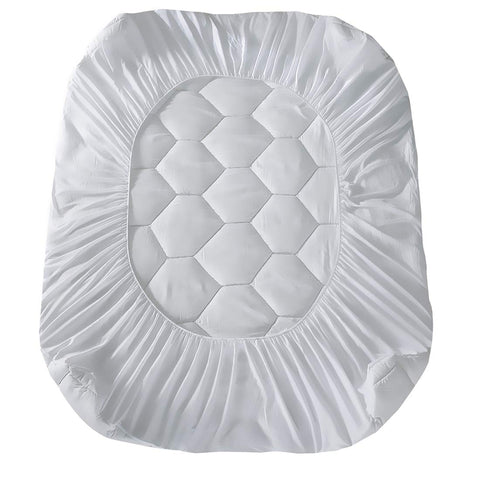 Favorland pad beside ruler showing scale and compatibility with deep mattresses