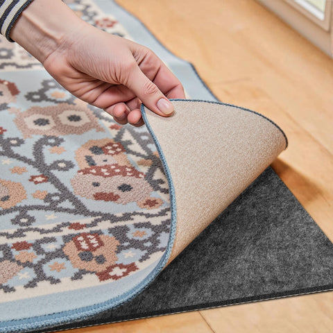 Fchuswty front view of rolled rug pad showing ready-to-install protection