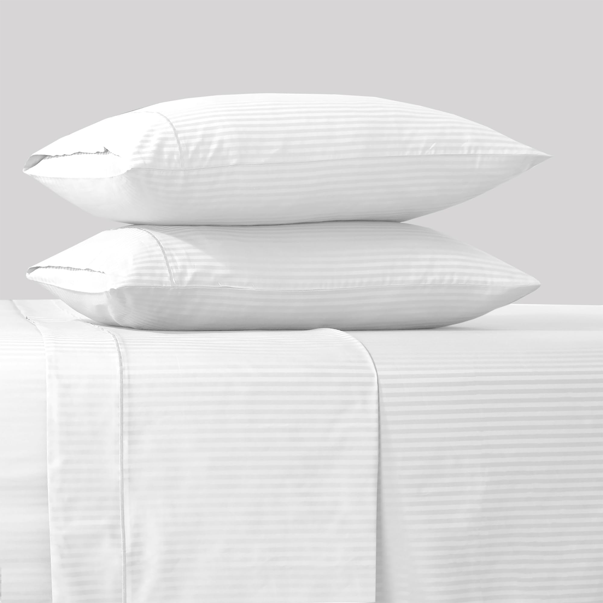 Feather & Stitch pillowcase hem closeup showing refined stitching and polished look