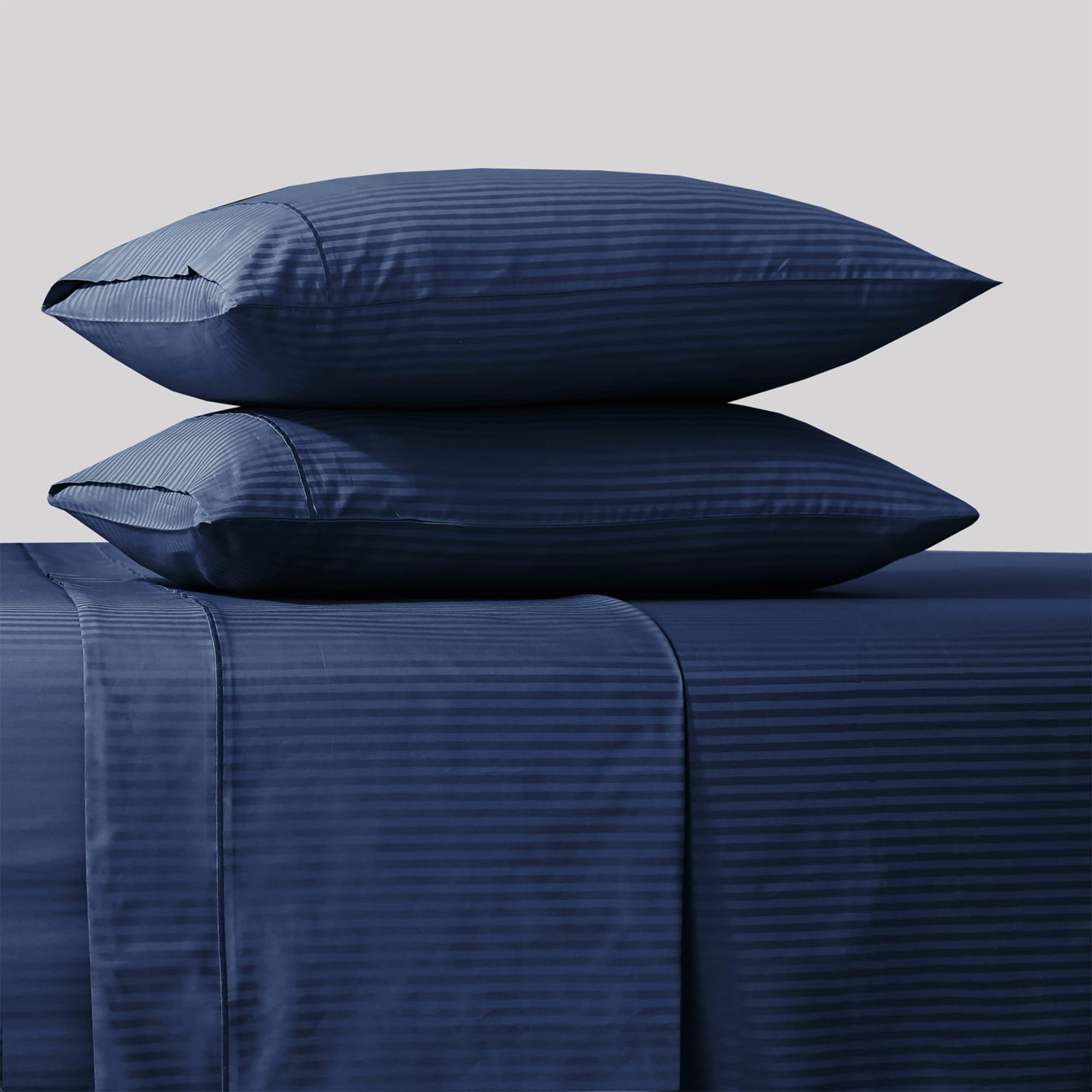 Feather & Stitch flat sheet hem and embroidery detail adding refined decorative finish