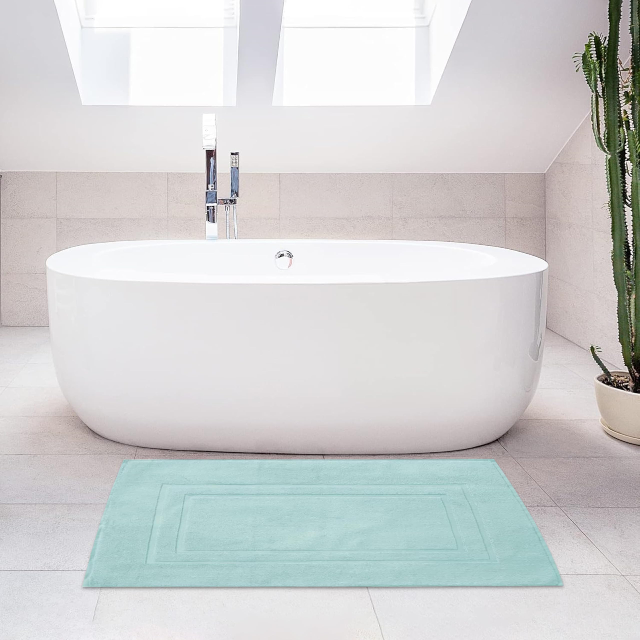 Feather & Stitch New York lifestyle shot in coastal bathroom conveying calm decor