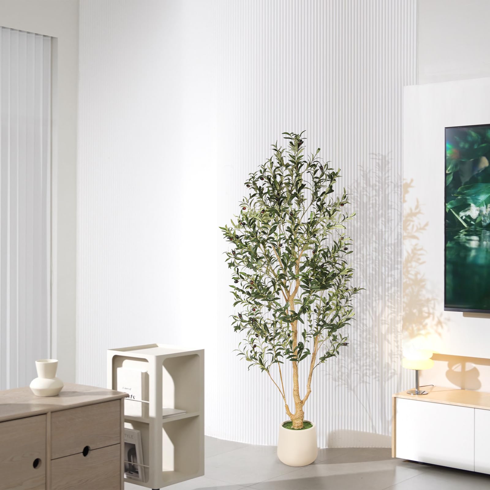 FEELEAD tree beside sofa demonstrating 6ft scale and proportion benefit