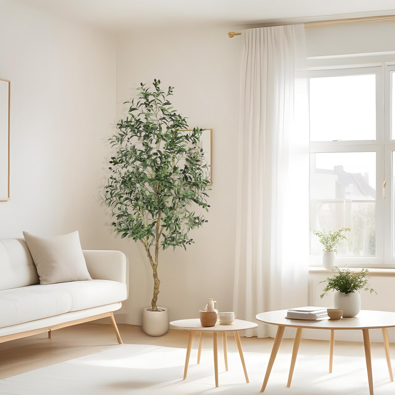 FEELEAD styled in living room adding warm greenery and vertical interest