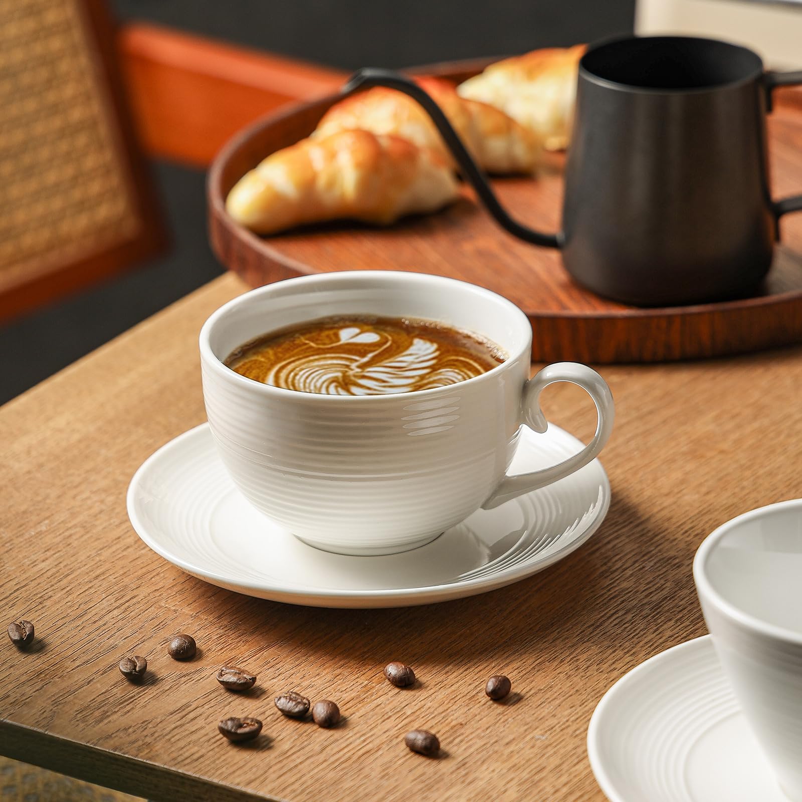 Feenmai four cups lined up on wooden table highlighting matching set uniformity