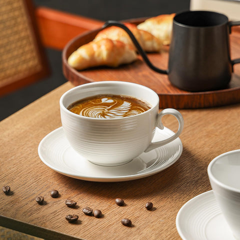 Feenmai four cups lined up on wooden table highlighting matching set uniformity