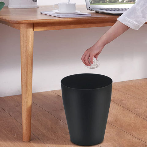 Feisco under an office desk showing discreet waste containment benefit
