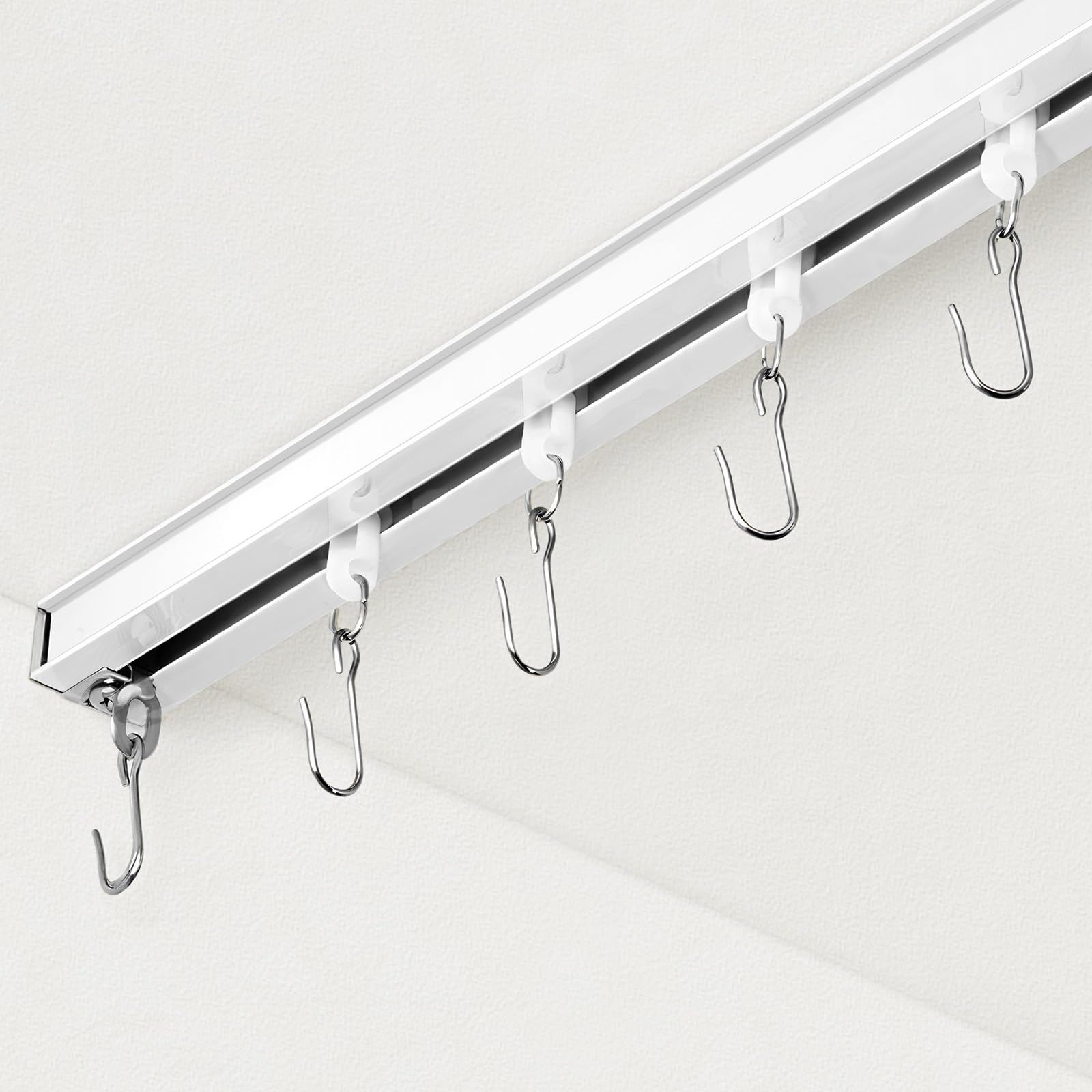 FELIDESIGN front view of white rail set showing sleek ceiling profile and clean finish