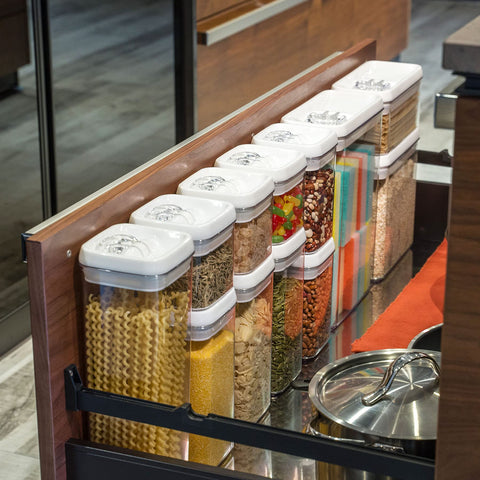 Felli open canister in use with one hand displaying convenient pouring and multitasking benefit