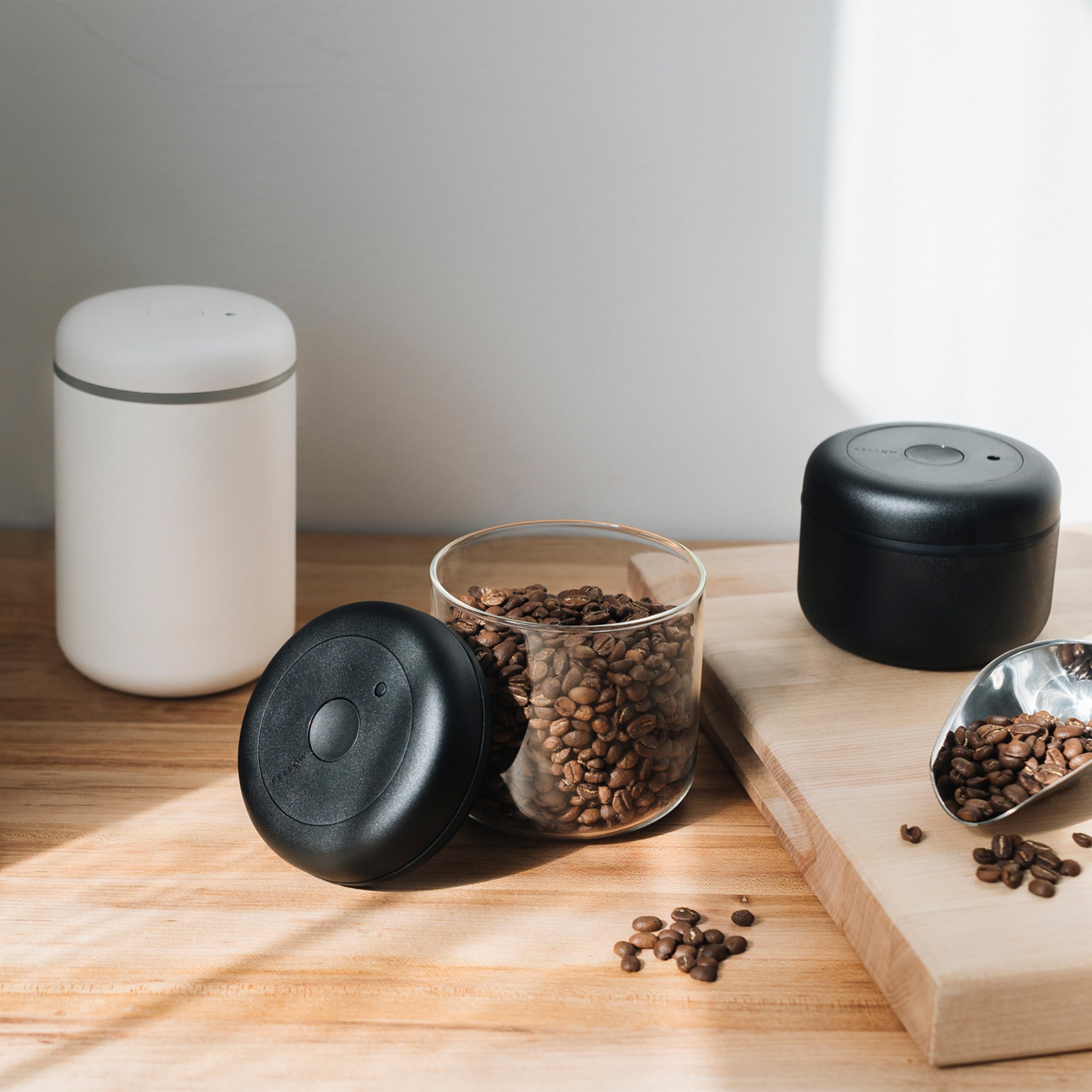Fellow Atmos open filled with coffee beans to preserve aroma and freshness