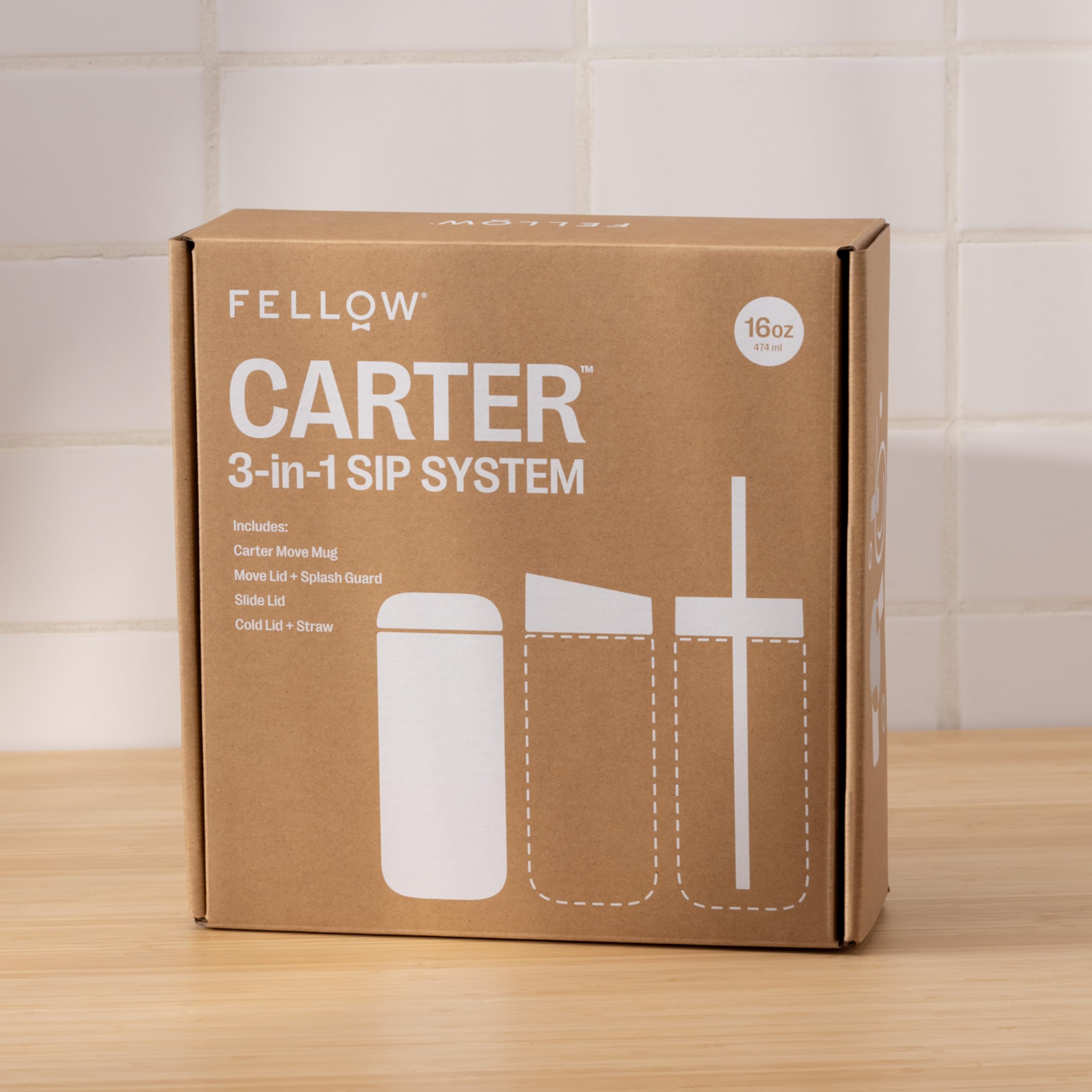 Fellow Carter on a café table styled for travel-ready beverage enjoyment