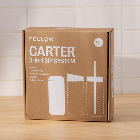 Fellow Carter on a café table styled for travel-ready beverage enjoyment