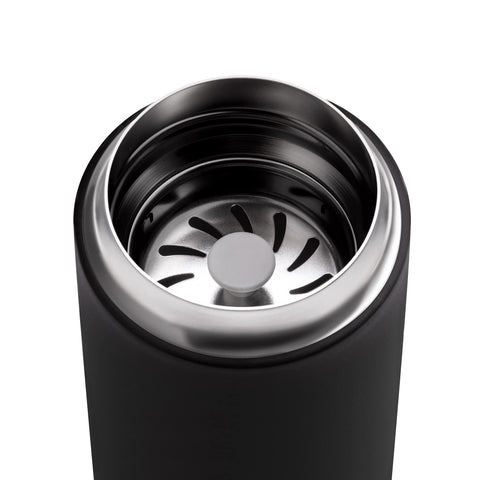 Fellow Carter Move placed in car cup holder for commute-ready convenience