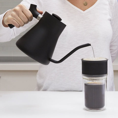 Fellow Stagg in kitchen during pour‑over brew demonstrating practical use