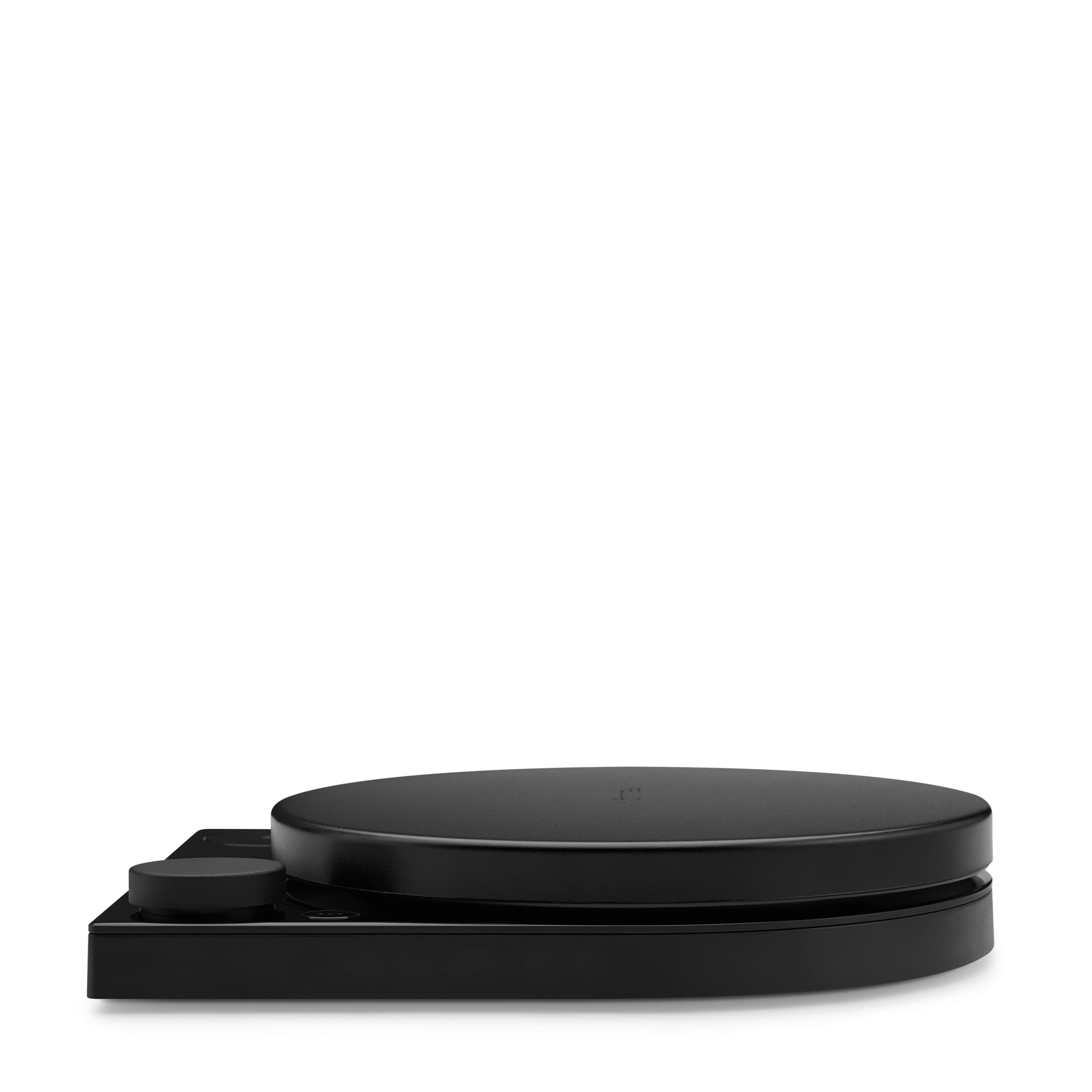 Fellow Tally Pro size comparison in hand illustrating compact footprint and portability benefit