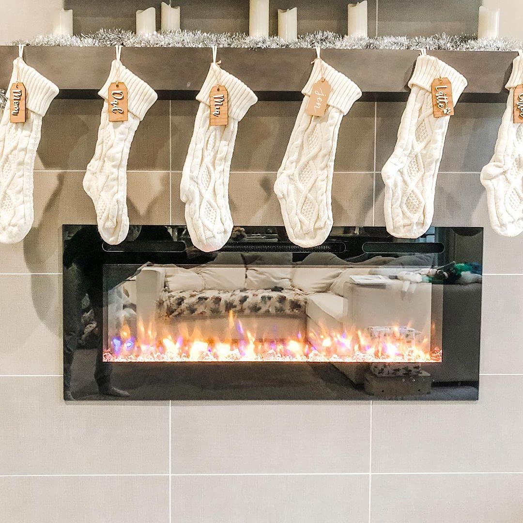 Fesciory stockings displayed on mantel creating warm festive atmosphere