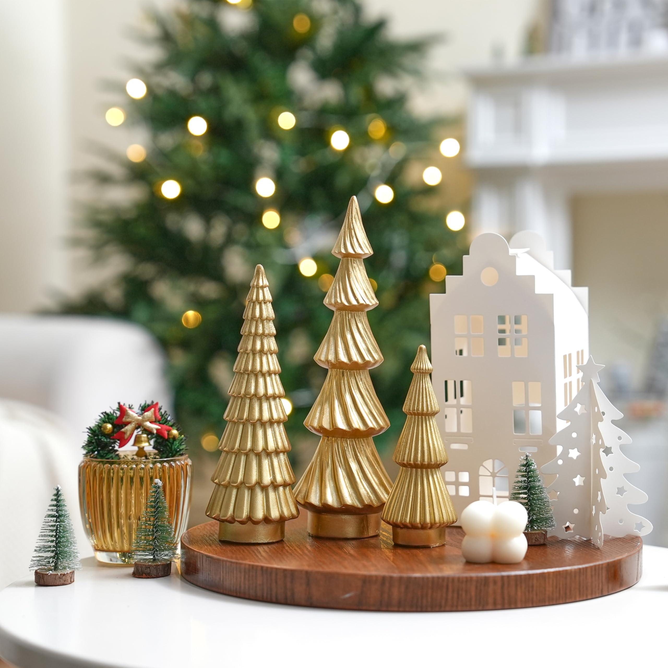 FESTGLOX trees on dining table in lifestyle scene adding elegant holiday ambiance